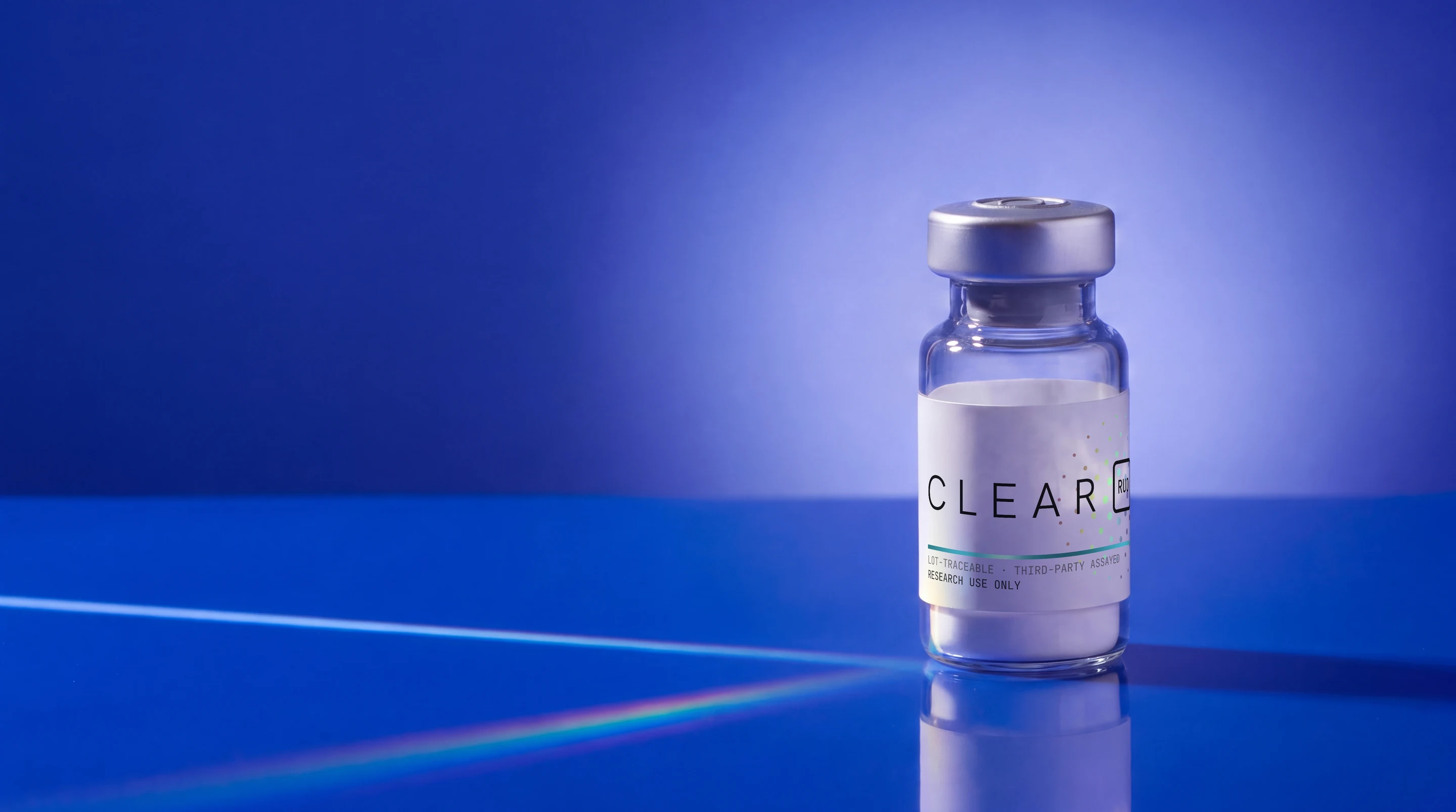A CLEAR RUO vial on a cobalt set